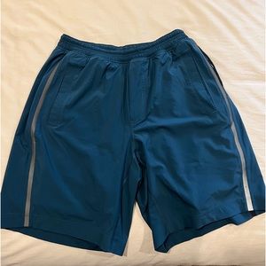turquoise lululemon 7” lined shorts